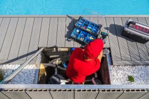 swimming-pool-maintenance-worker-resize.jpg